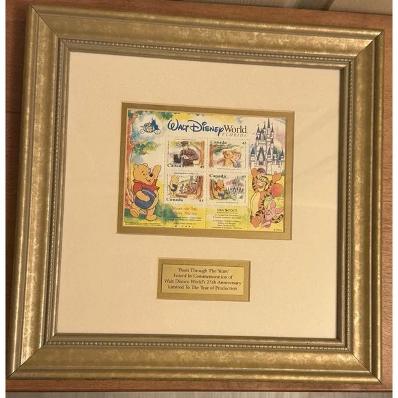 POOH THROUGH THE YEARS COMMEMORATION OF DISNEY WORLDS 25TH ANNIVERSARY COA FRAME
